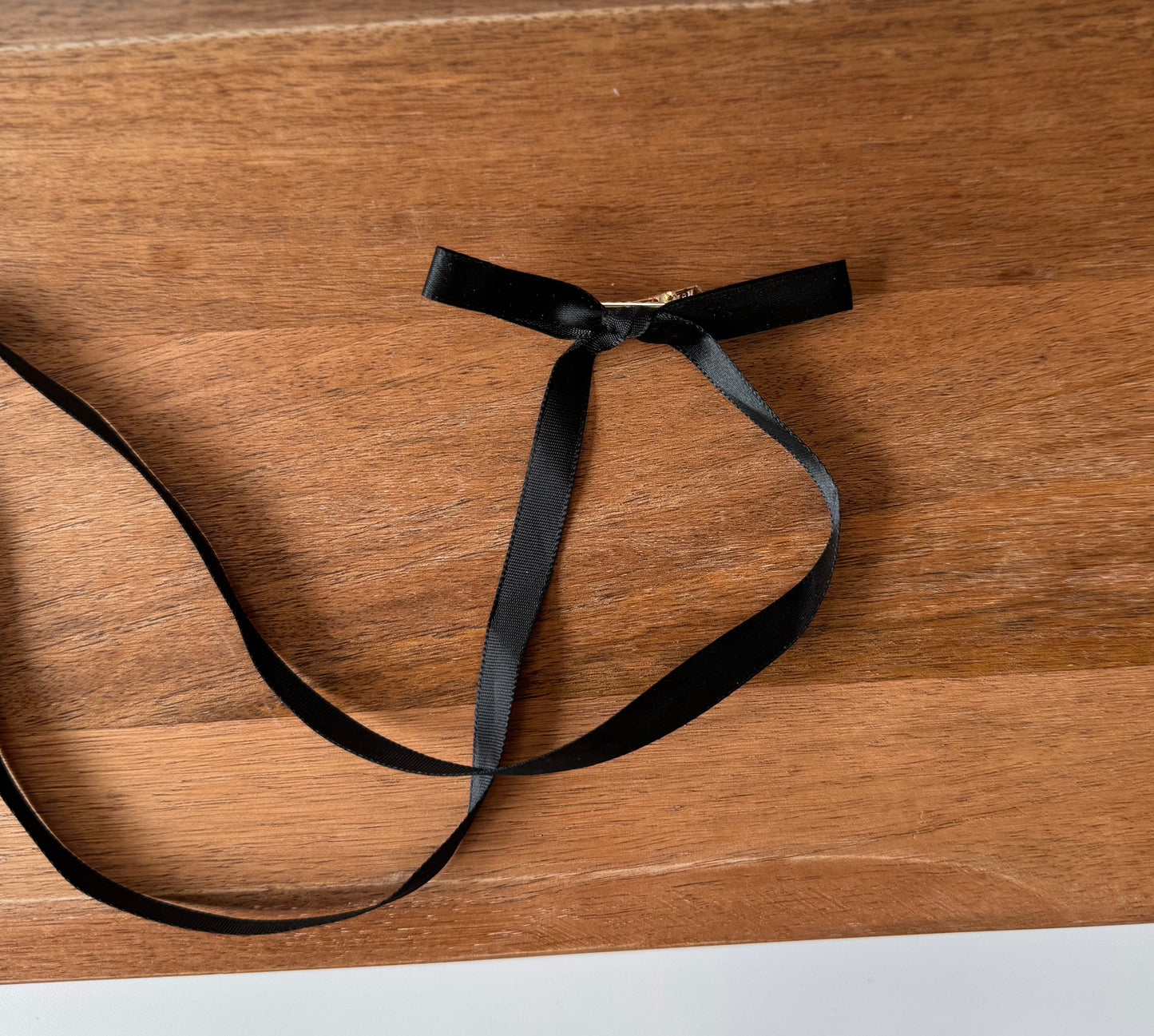 Teensy black ribbon clip
